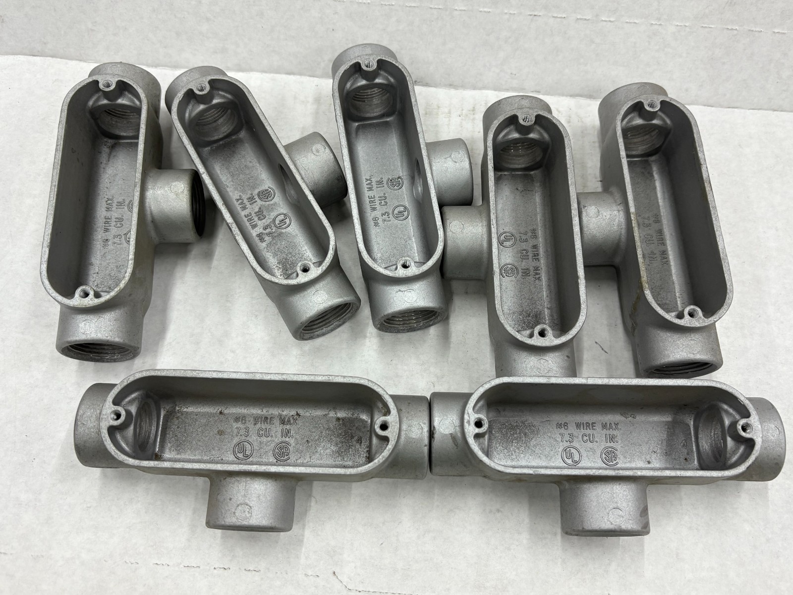 LOT OF (7) RED DOT 3/4" ALUMINUM CONDUIT BODY TYPE T #6 WIRE MAX 7.3 CI REDDOT