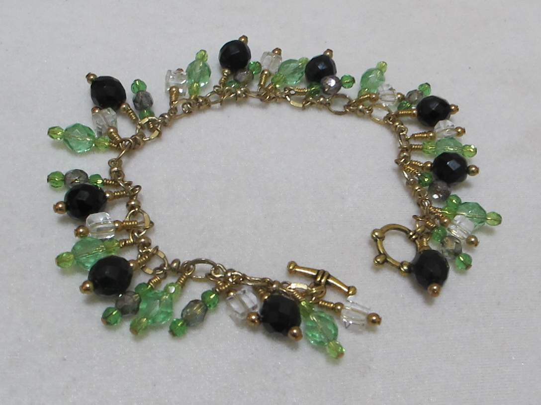 Artisan 9” Gold Tone Charm Bracelet Lt Green, Black, Clear Dangling Crystals