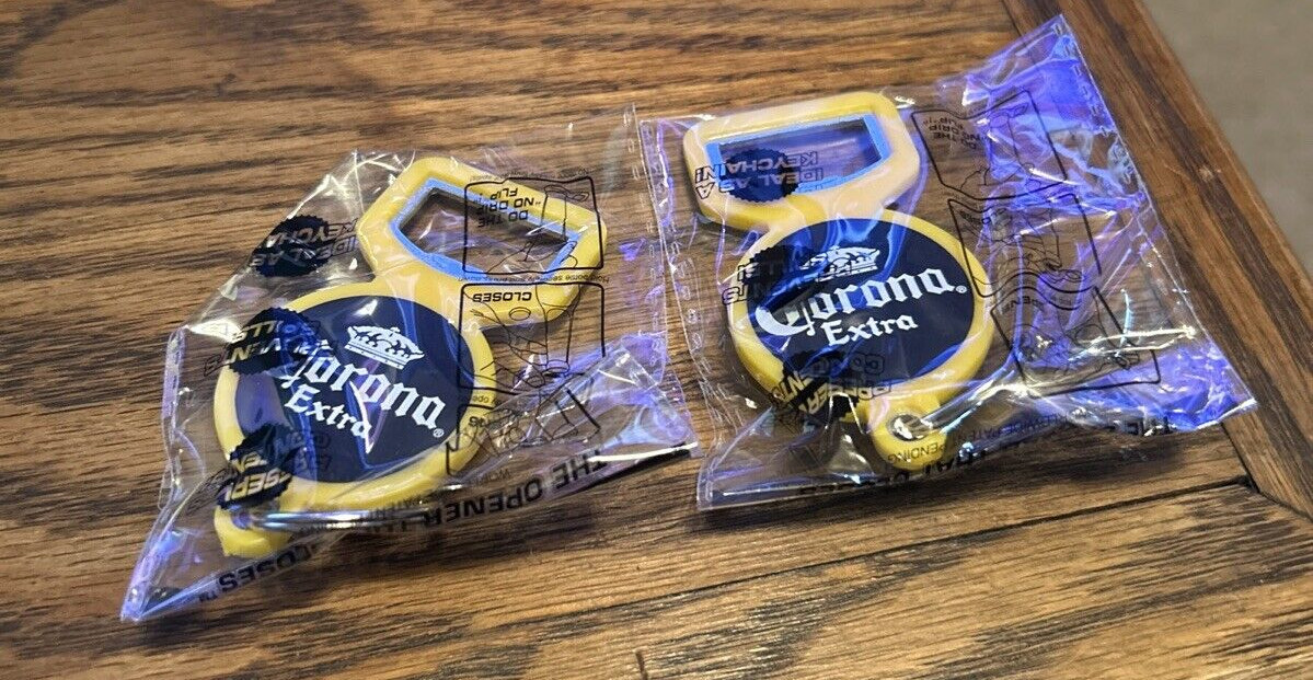 Pair of NEW Corona Extra Bottle Tool The Opener Cap Saver Keychains