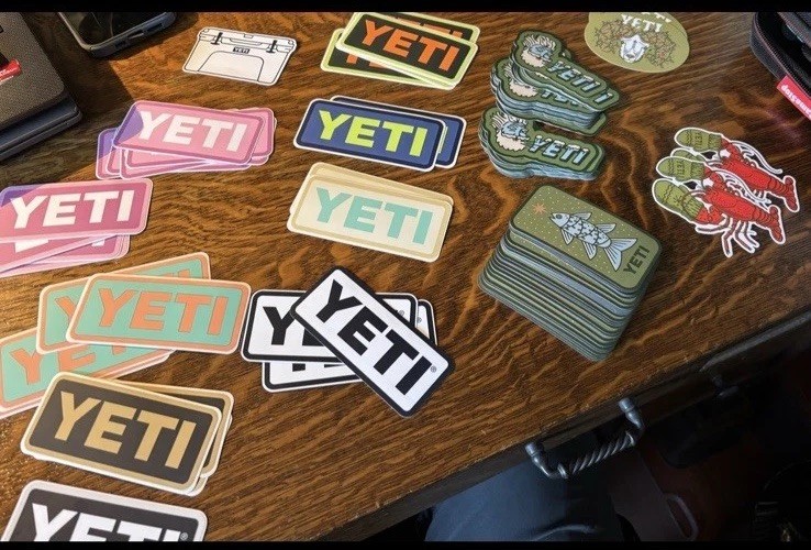 LARGE LOT OF AUTHENTIC YETI FACTORY ISSUED STICKERS SEASONAL HARD TO FIND -PATCH