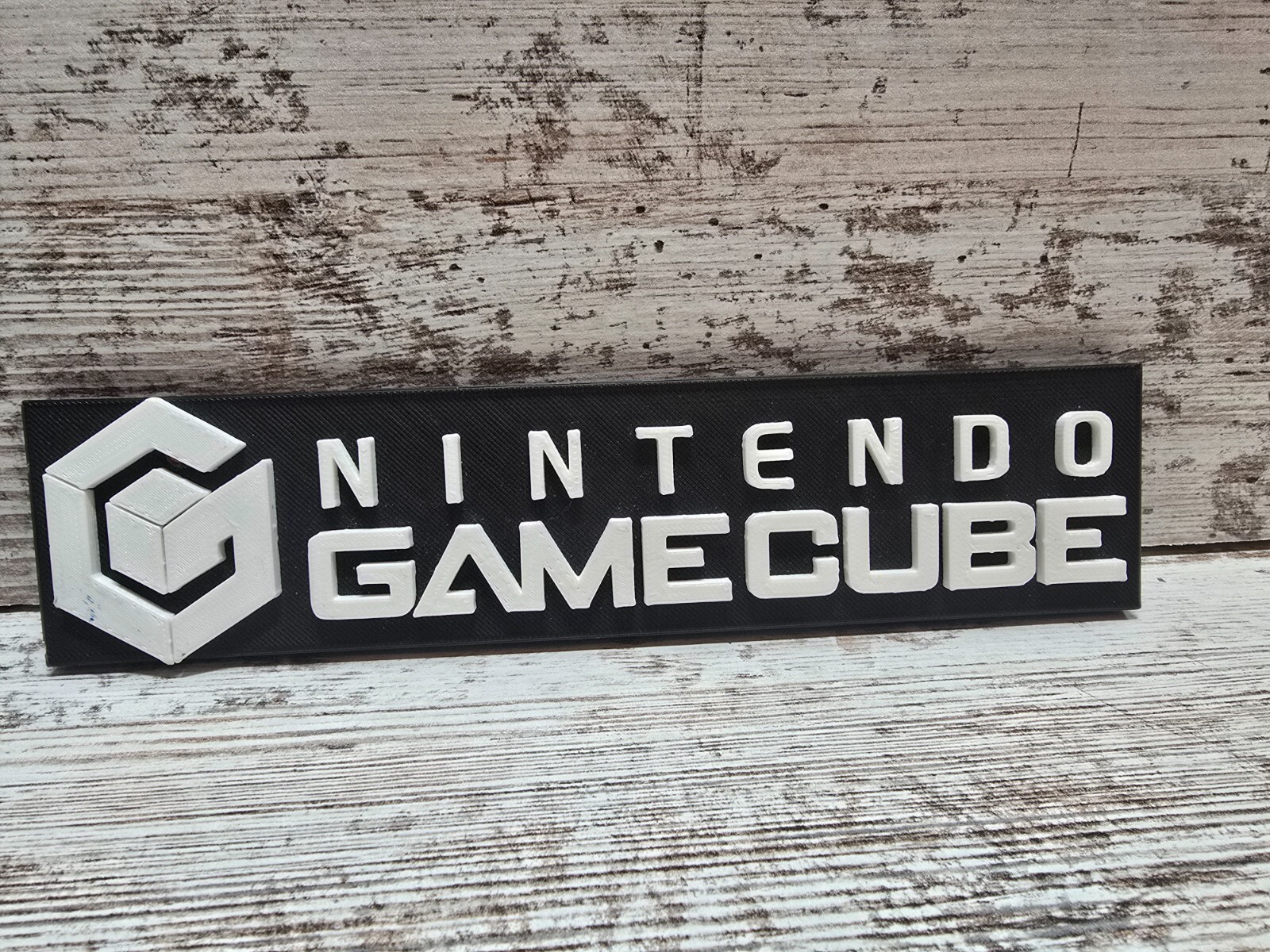 nintendo game cube 8 1/2 x 2 plastic name plate