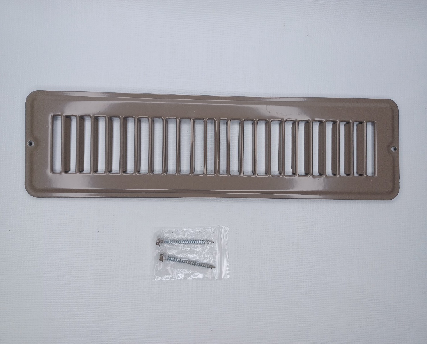 Altus 12" x 3" Floor Toe Space Grille Brown Steel