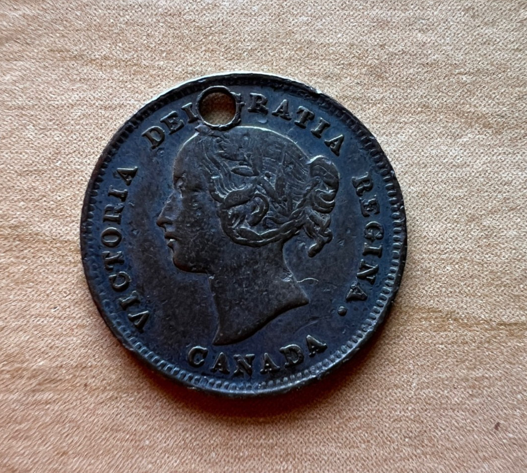 1898 Canada 5 cent coin with hole