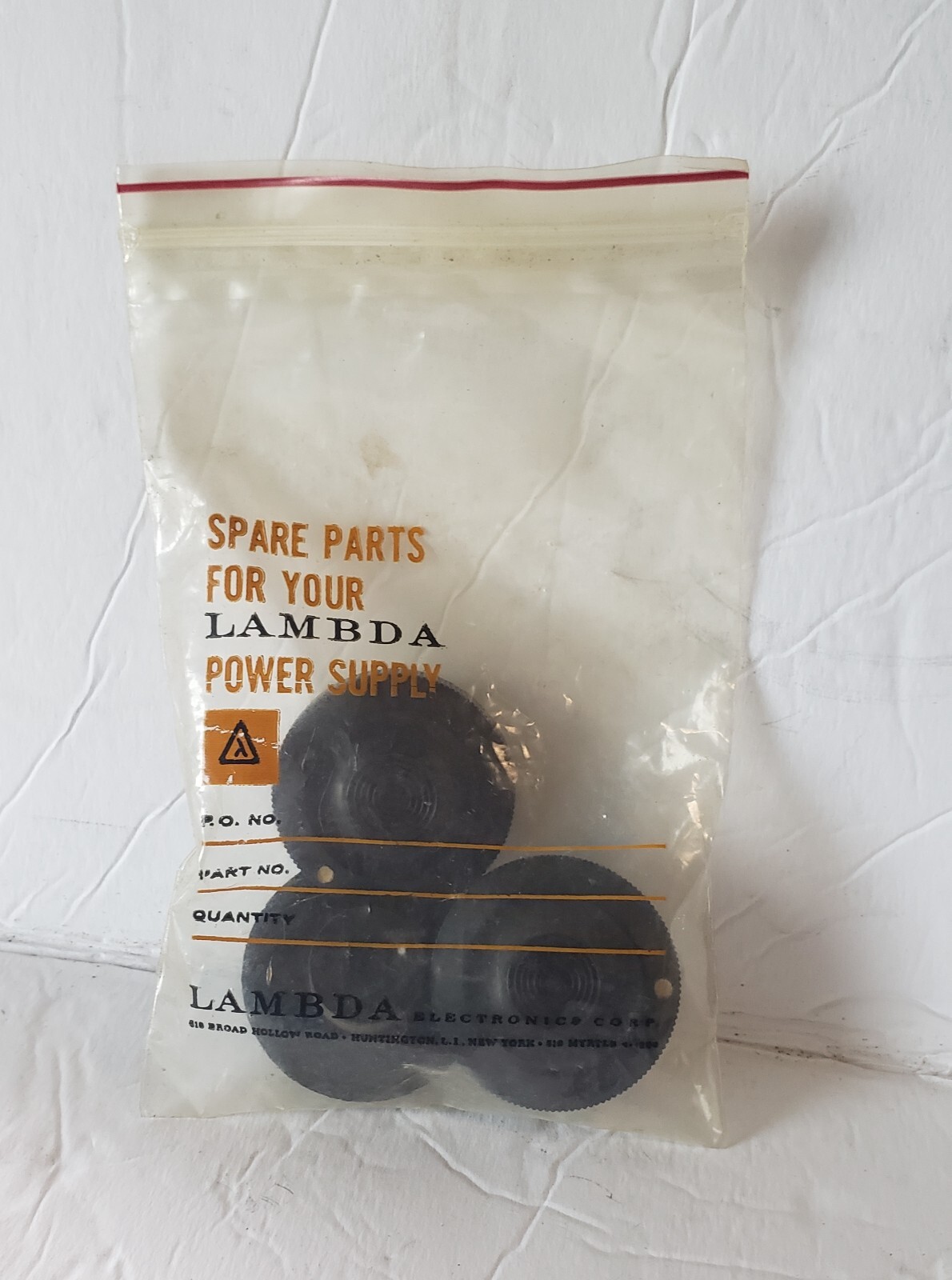 bag of (3) Lambda Power Supply plastic knobs