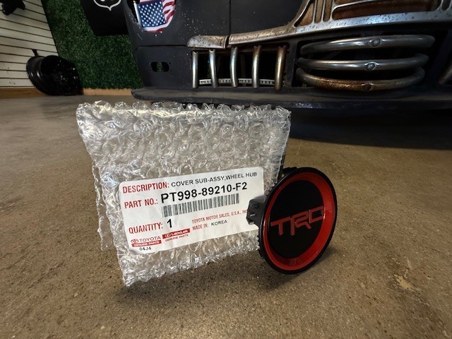 (1) Genuine Toyota Red / Black TRD  Center Cap PT998-89210-F2  - same as dealer