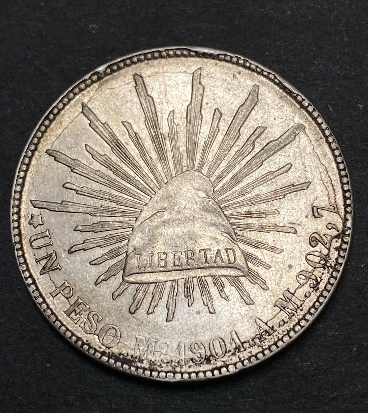 1901 Mexico Silver Peso Obverse & Reverse Lamination Left Extra Leaf Mint Error