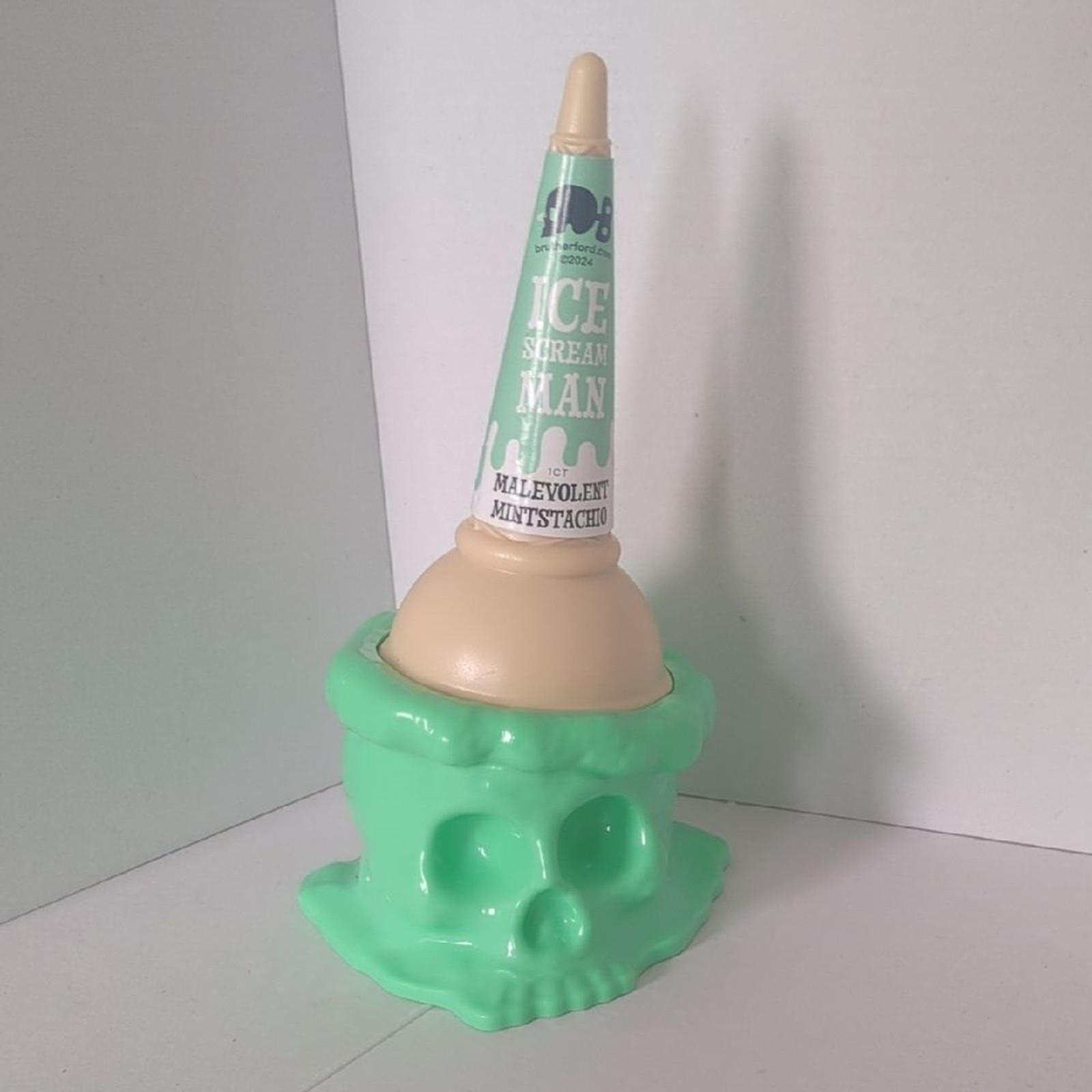 "Malevolent Mintstachio" Green Skull Plastic Ice Cream Cone Holder