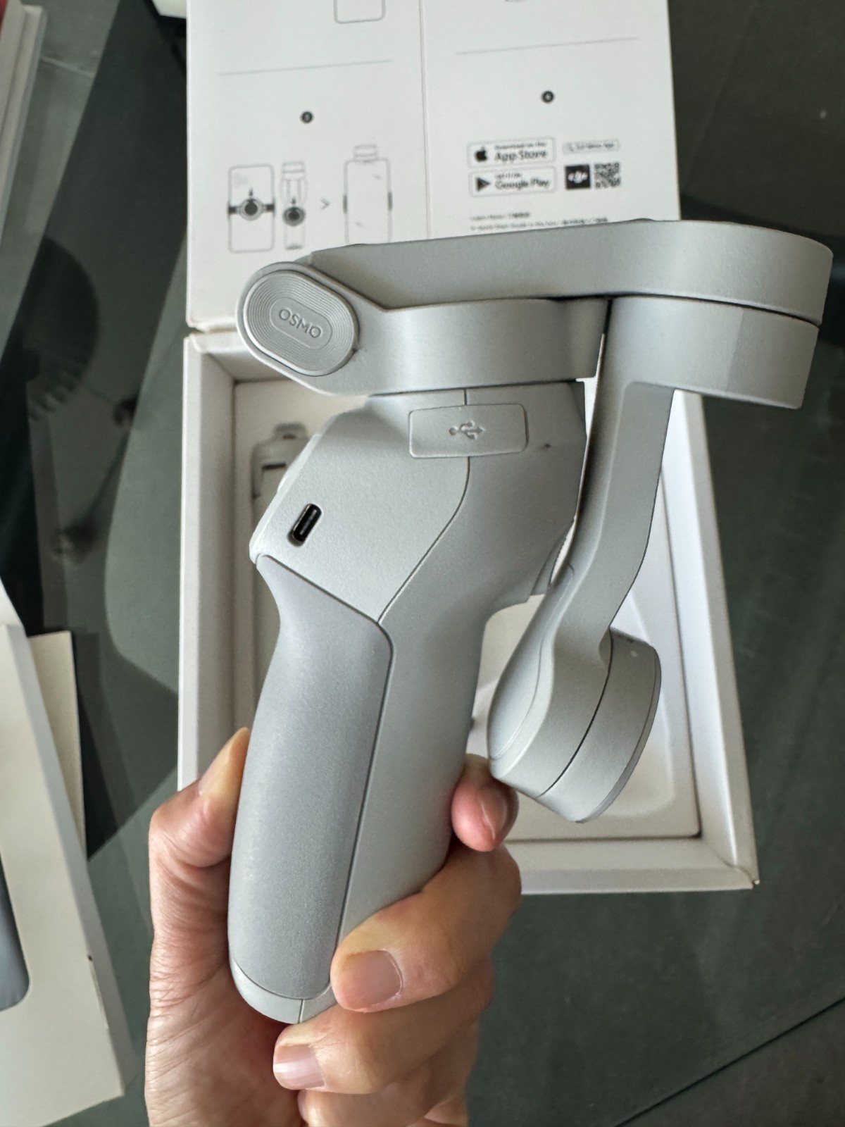 DJI OM 4 smartphone gimbal stabilizer kit.