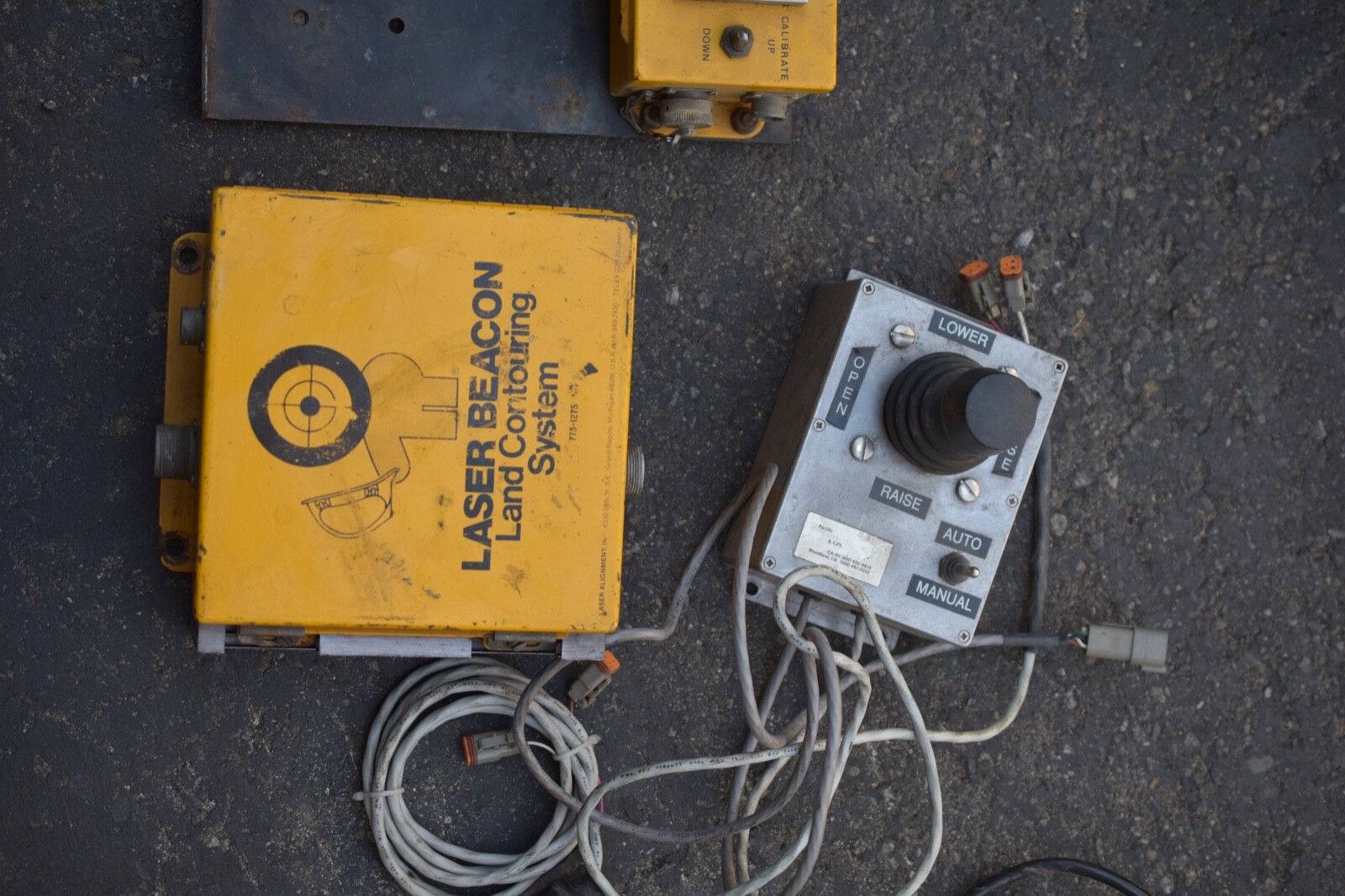 Laser alignment beacon land contouring system