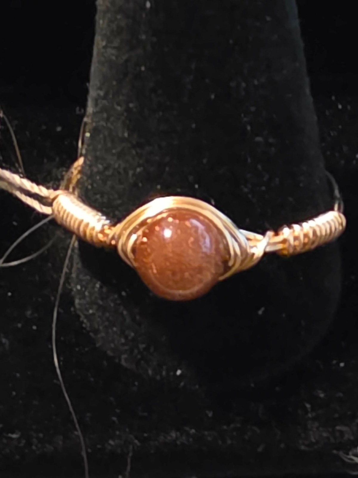 Handmade size 11 Wire-Wrapped Goldstone Ring with Gold-Tone Plated Wire