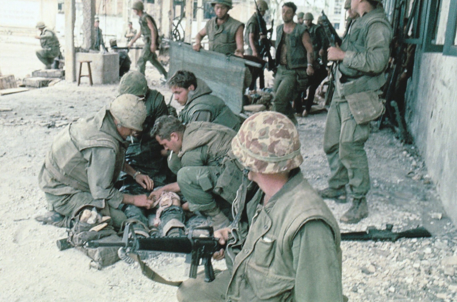 Vietnam  War  Photos --   Medic Helping   Wounded Soldier