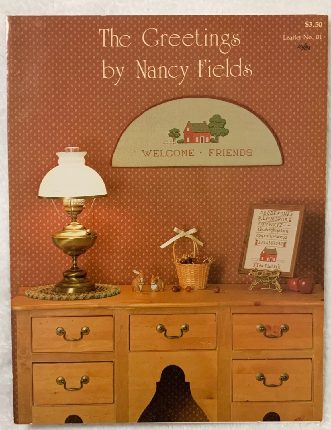 1983 NEEDLES & CO “The Greetings” Counted Cross-Stitch Design–Farmhouse Trees