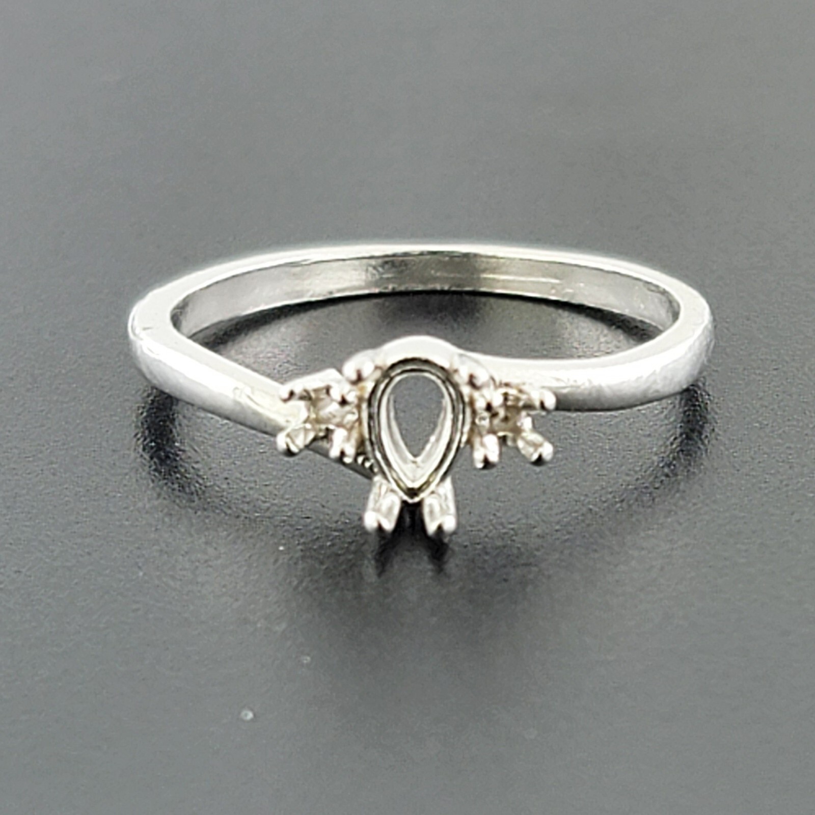 PRE-NOTCHED 6X4MM PEAR SOLITAIRE RING 2MM RD ACCENTS .925 STERLING CR322SS