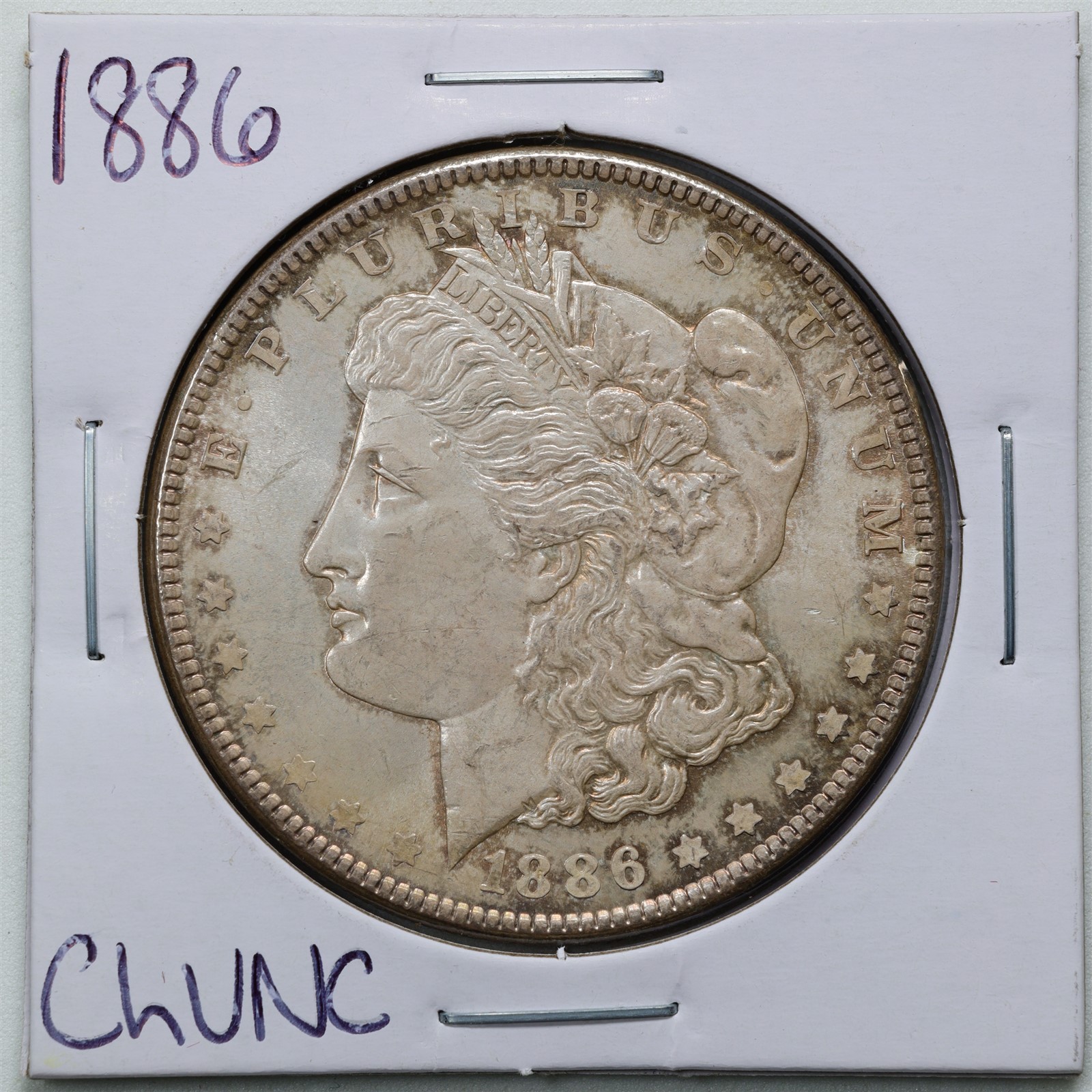 1886 $1 Morgan Silver Dollar in Choice UNC Condition #BH01266