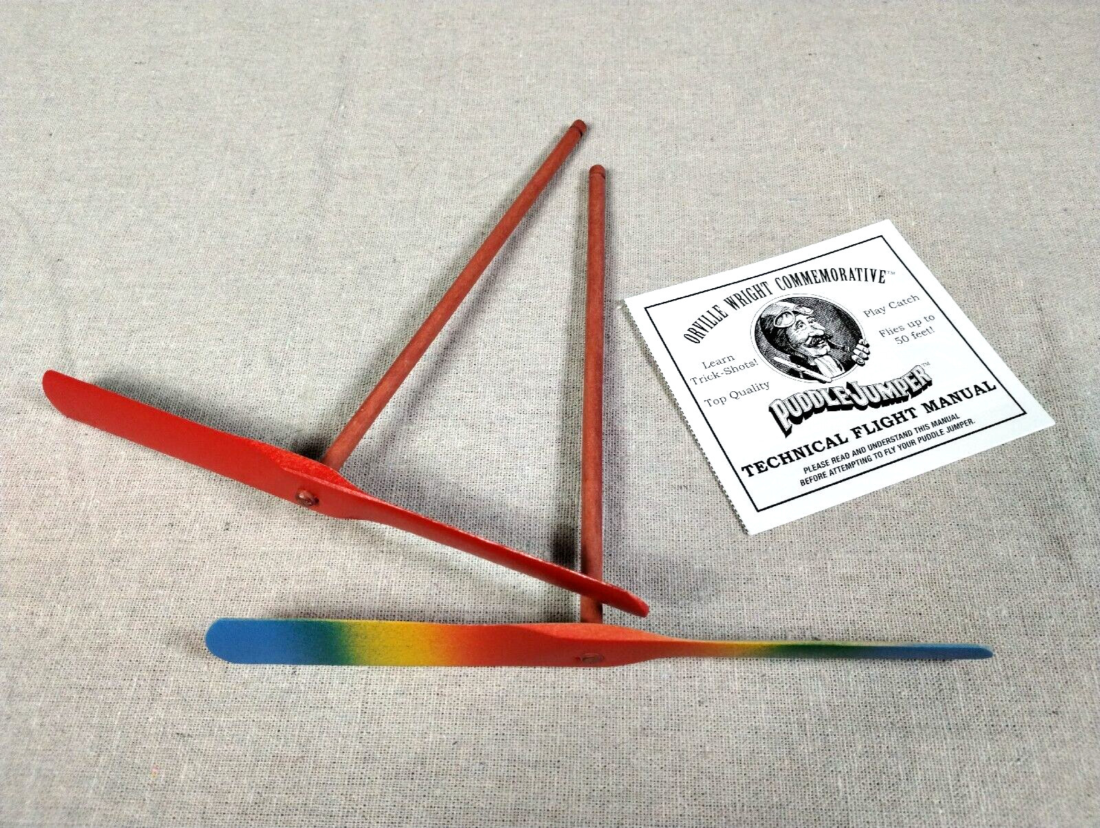 Aero Motion Puddle Jumper Hand Propelled Flying Wood Toy RAINBOW & RED w/booklet