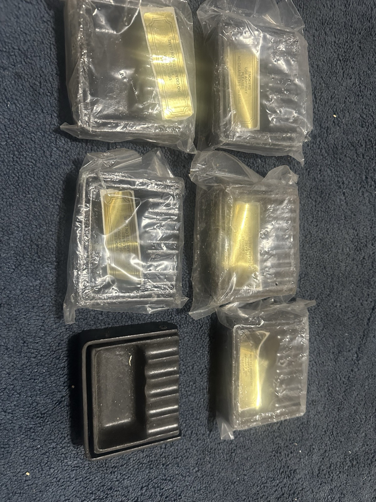 6 Nos ashtrays for arcade games.