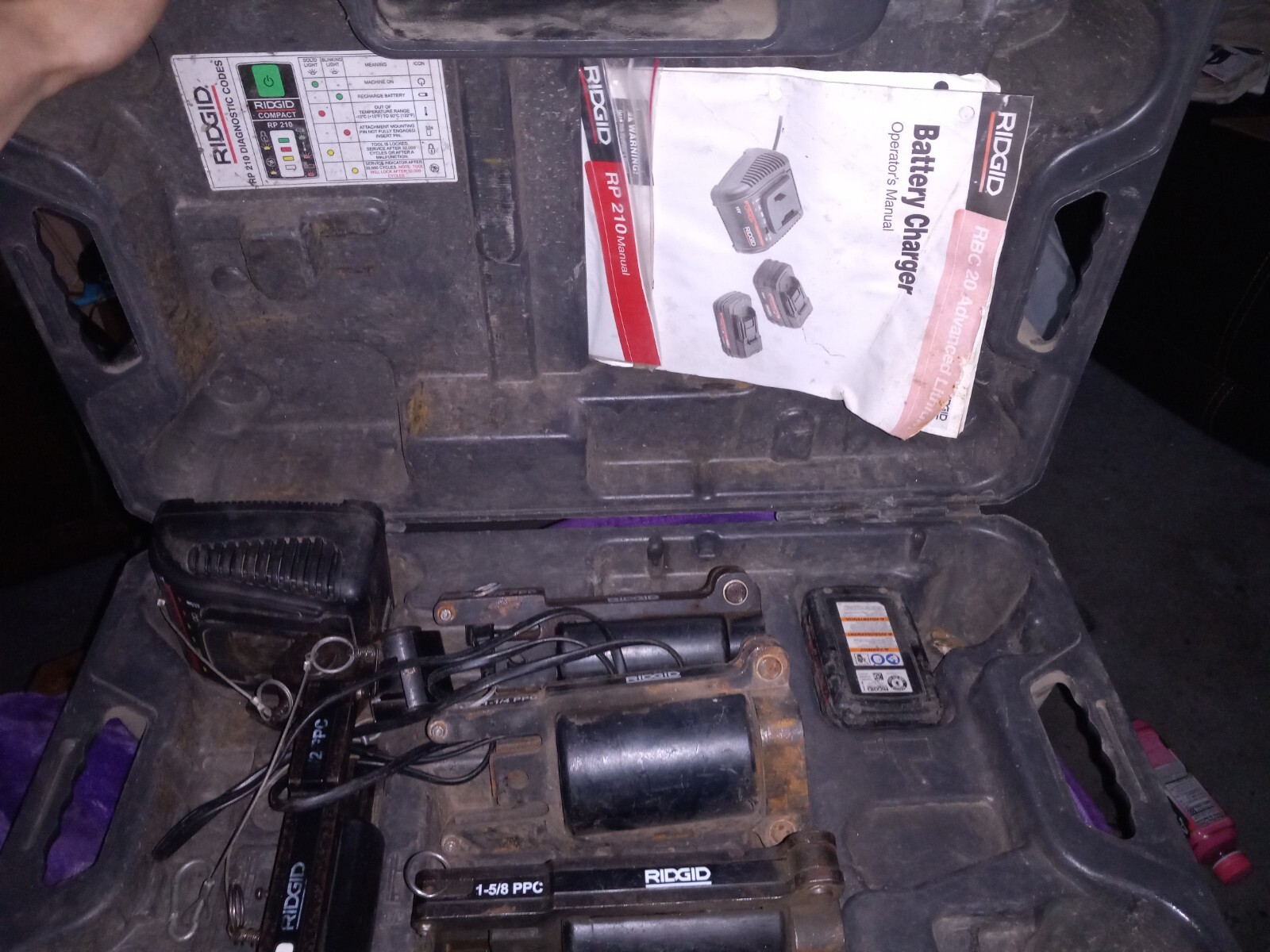 Ridgid RP 210 + charger = Battery + 4 jaws