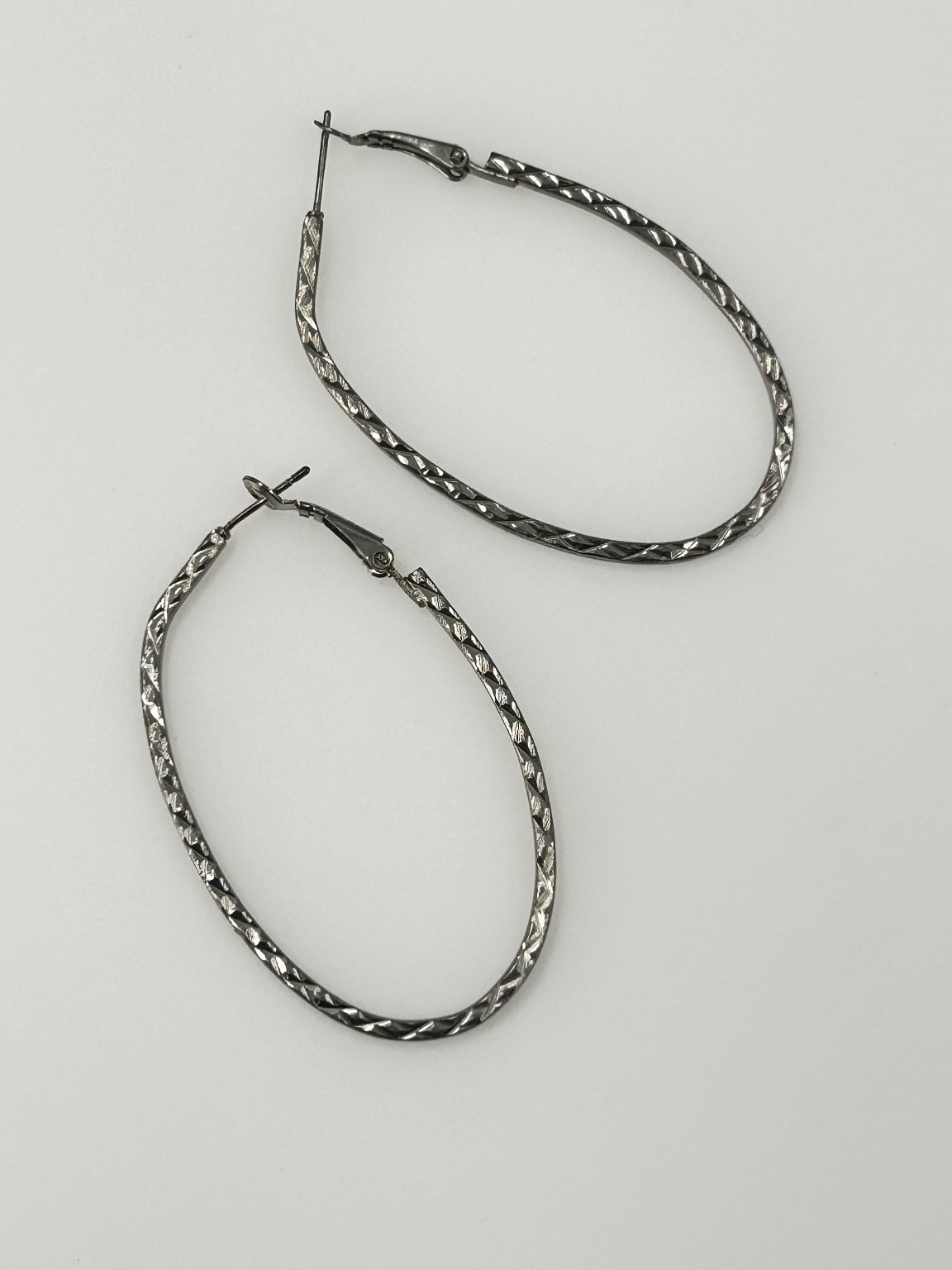 Silver Tone Textured Oval Hoop Earrings Lightweight