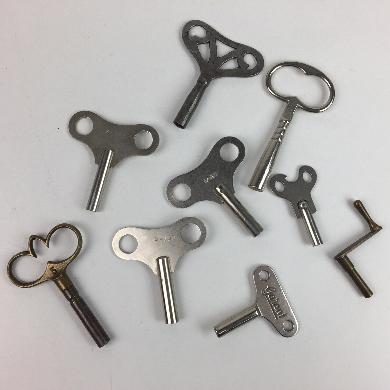 8 x vintage clock winding keys - brass, steel - Garant - variety of sizes