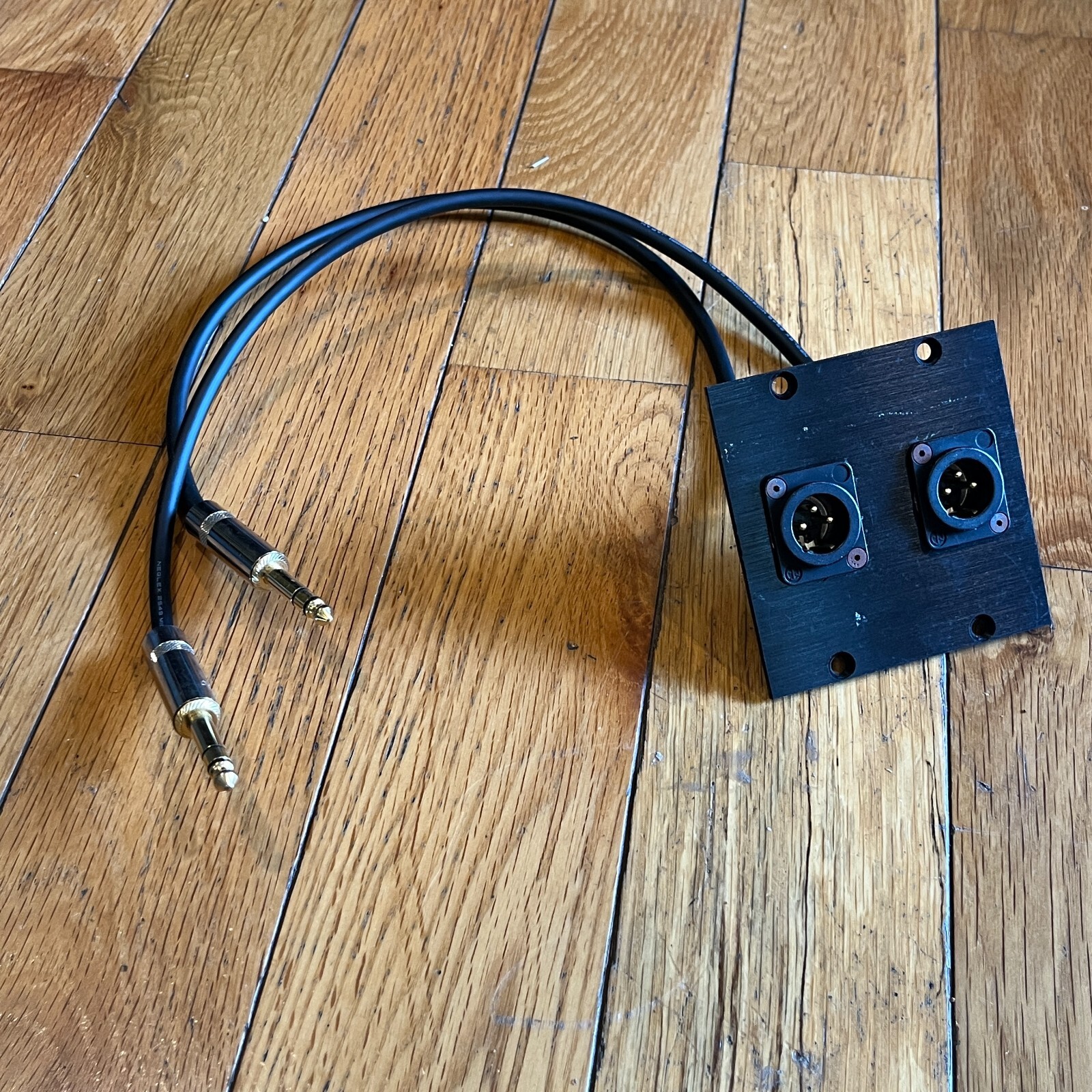 2x Male XLR patch panel to 2x Male stereo phono connectors