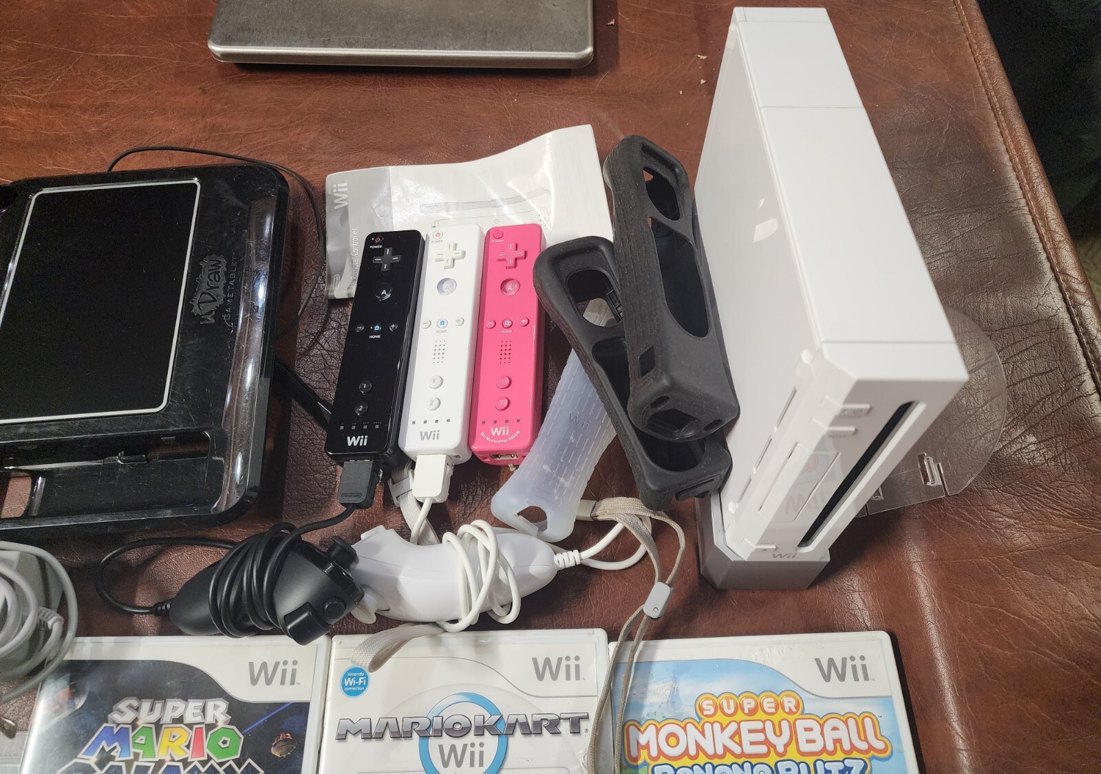 Wii Console plus, 9 games, 2 remotes, 1 nunchuck, System Plus Hookups & More