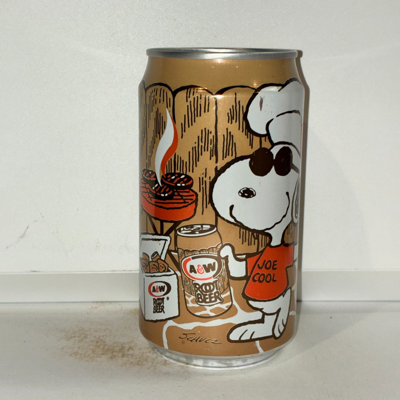 A&W Root Beer, Snoopy BBQ soda can, bottom opened
