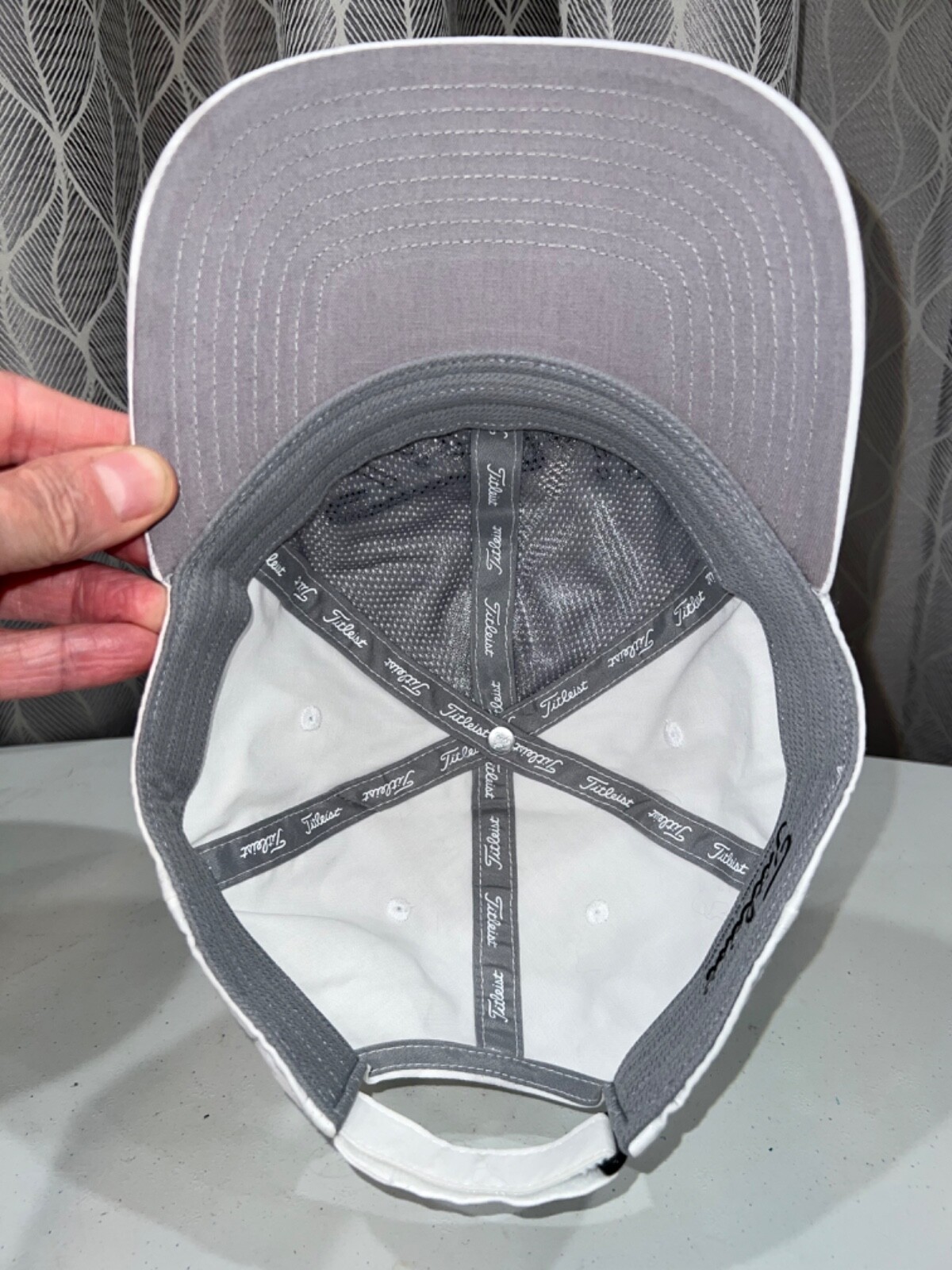 Titleist embroidered in Black on White on White Hat Cap Hook Loop Gray Band EUC