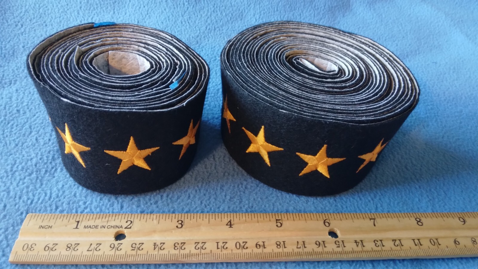 ROLL OF 170+ - US MILITARY YELLOW STARS ON BLACK FELT - NEW
