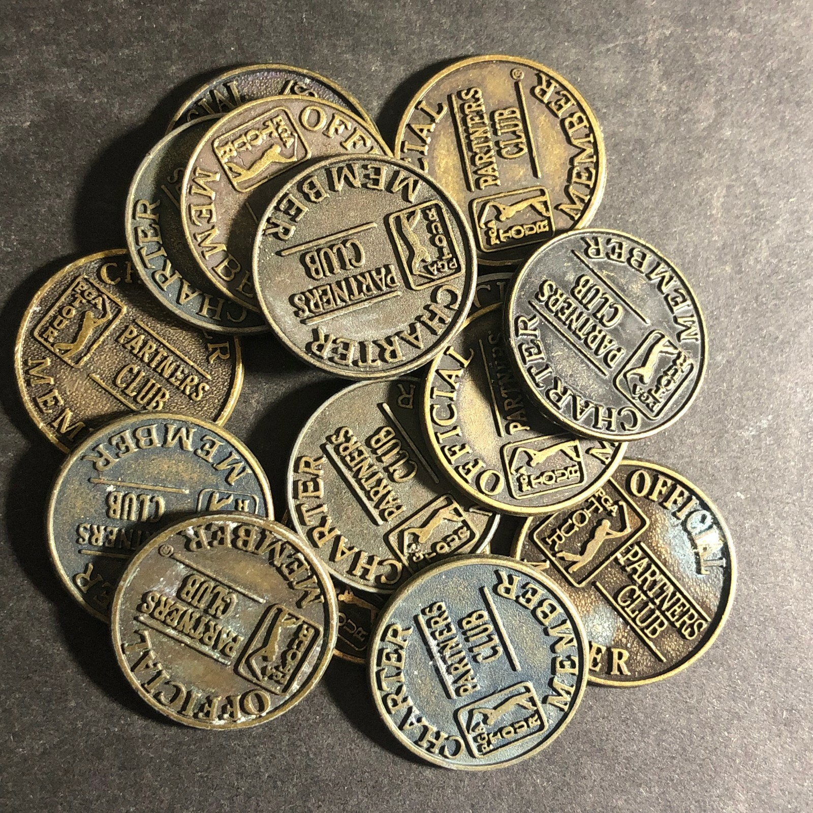 Group of 15 Antiqued Bronze PGA "Partners Club" Token / Golf Ball Marker