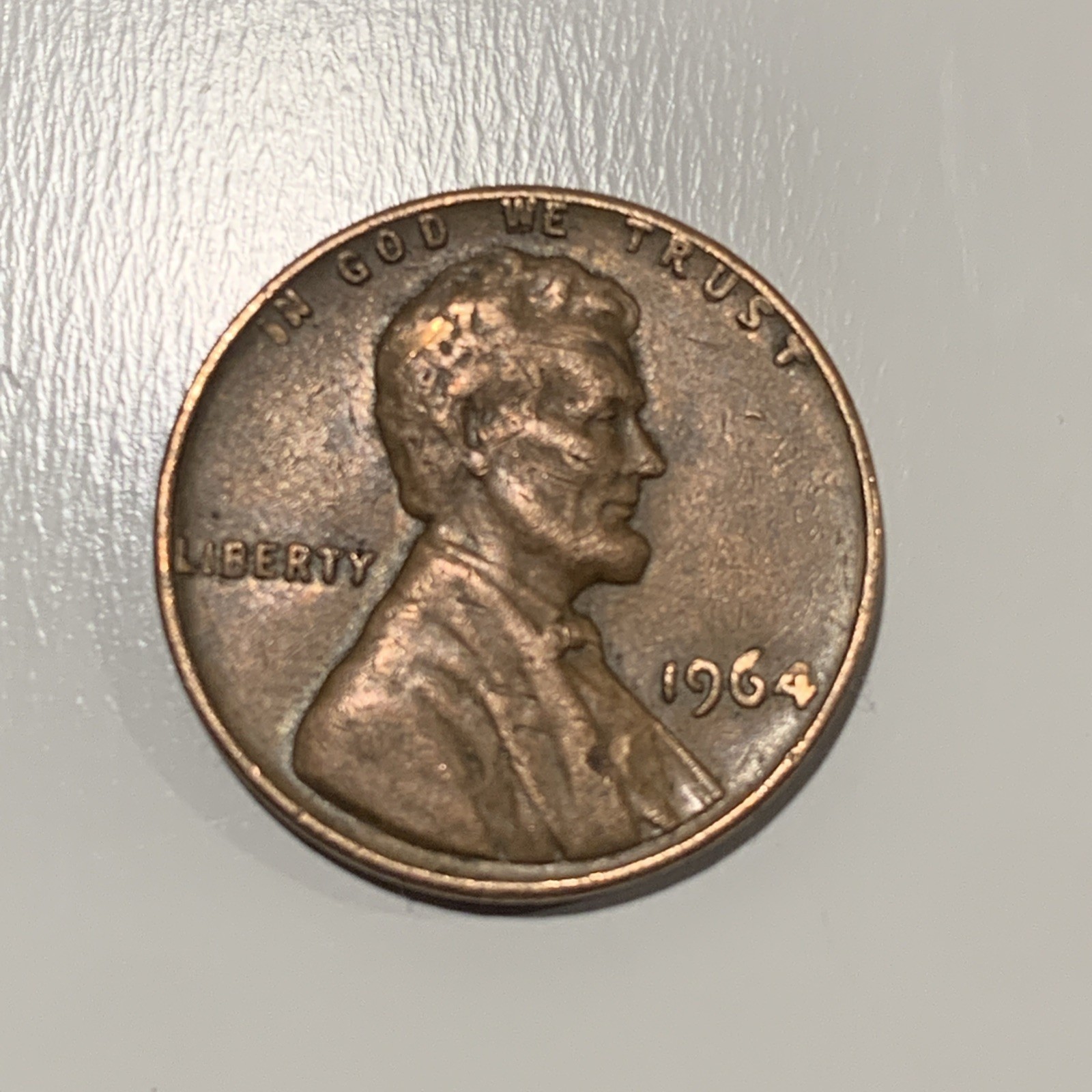 1964 Penny L on rim in Liberty error penny