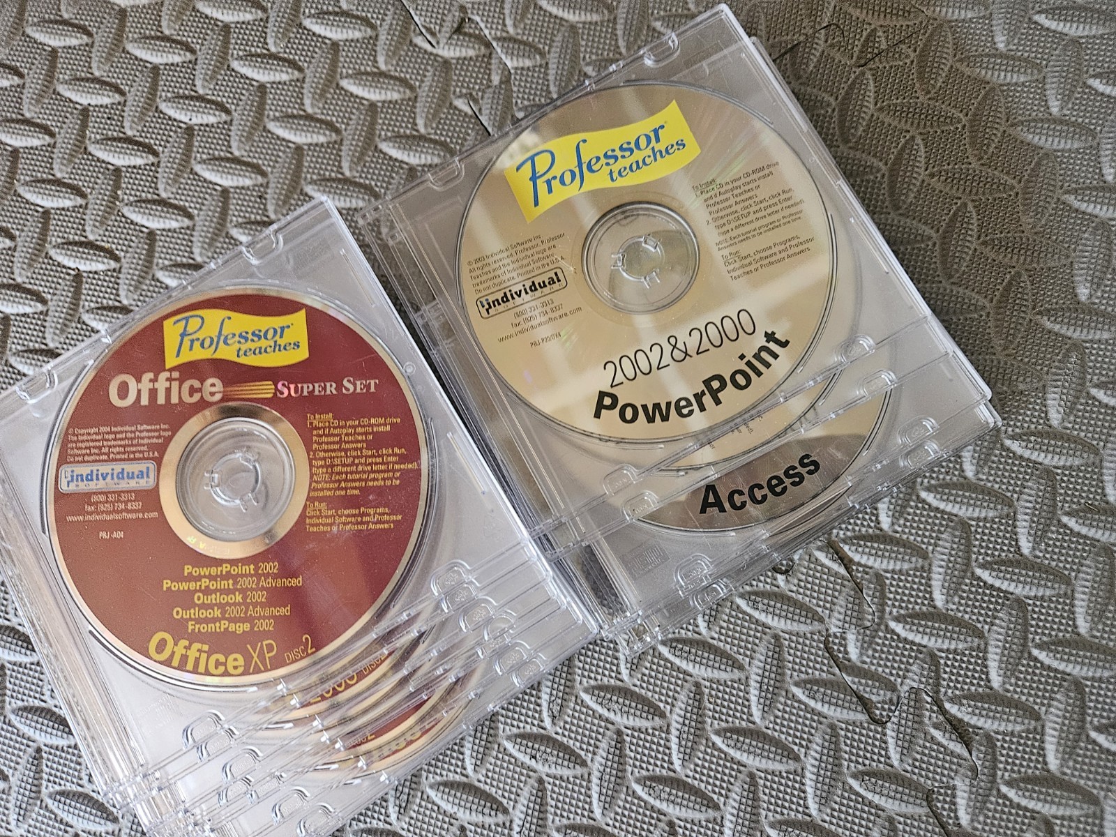 Professor Teaches Office 2000- 2002-2003 set. 16 cds