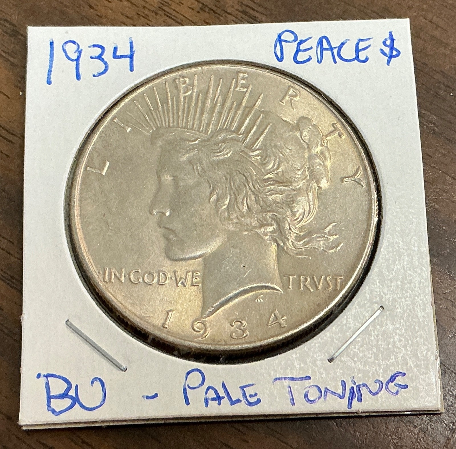 1934 $1 Peace Silver Dollar - BU - Pale Toning.
