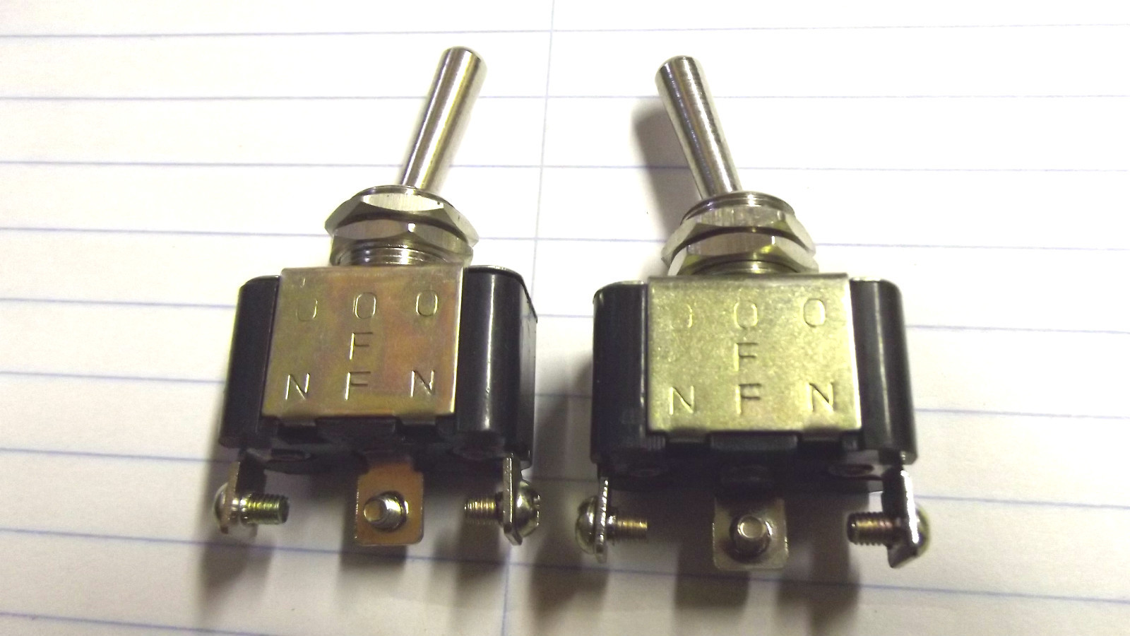 2 LIGHT DUTY,AMP UNKNOWN,SHORT ARM ON-OFF-ON TOGGLE SWITCH,7/16" HOLE,STUD SIZE.