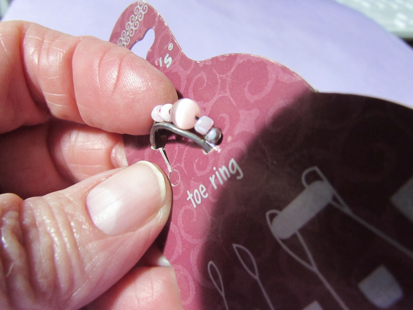 CLAIRE's BOUTIQUE silvertone toe ring with pink beads