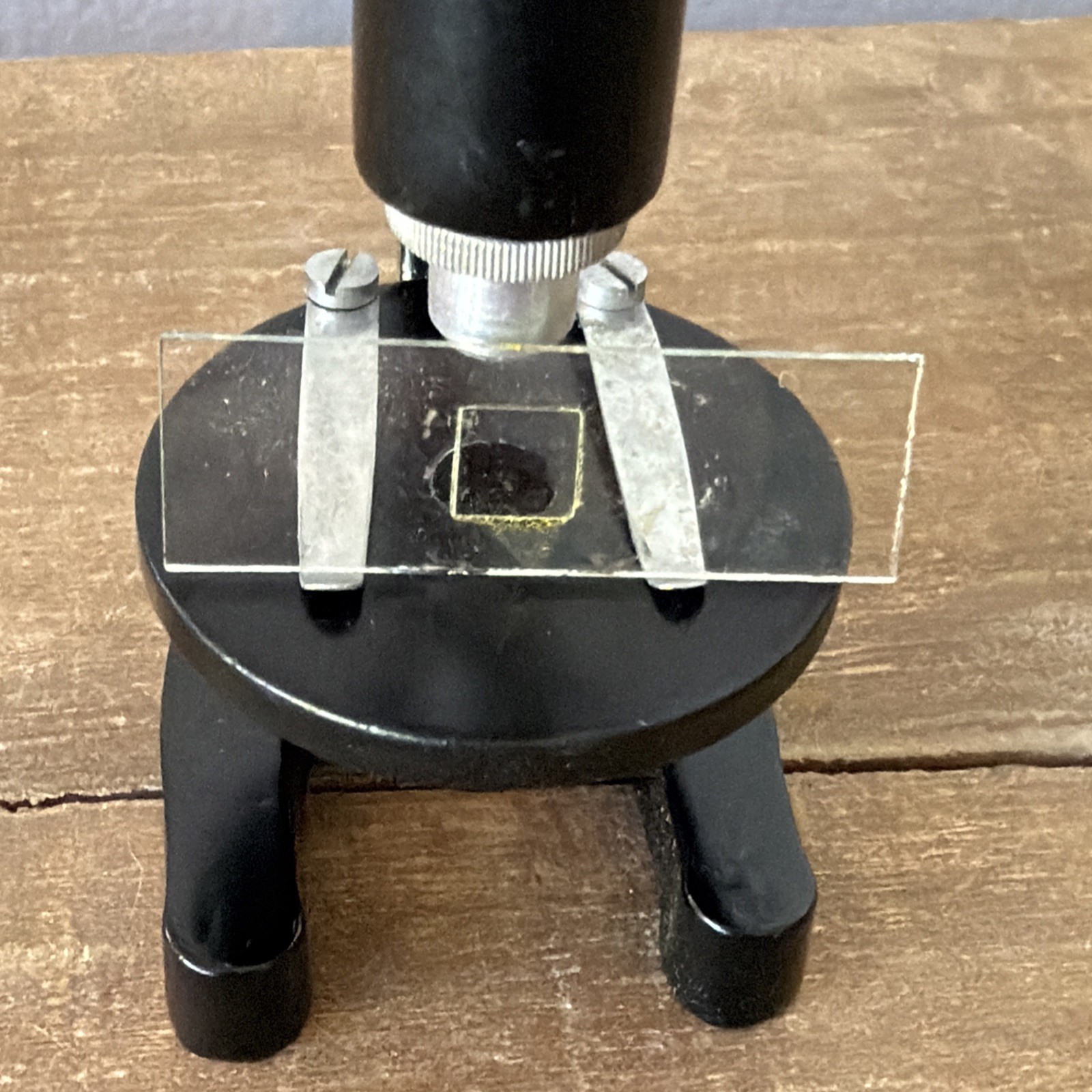 Vintage HIKA 150x Microscope 5in. Includes 3 slides and original box.
