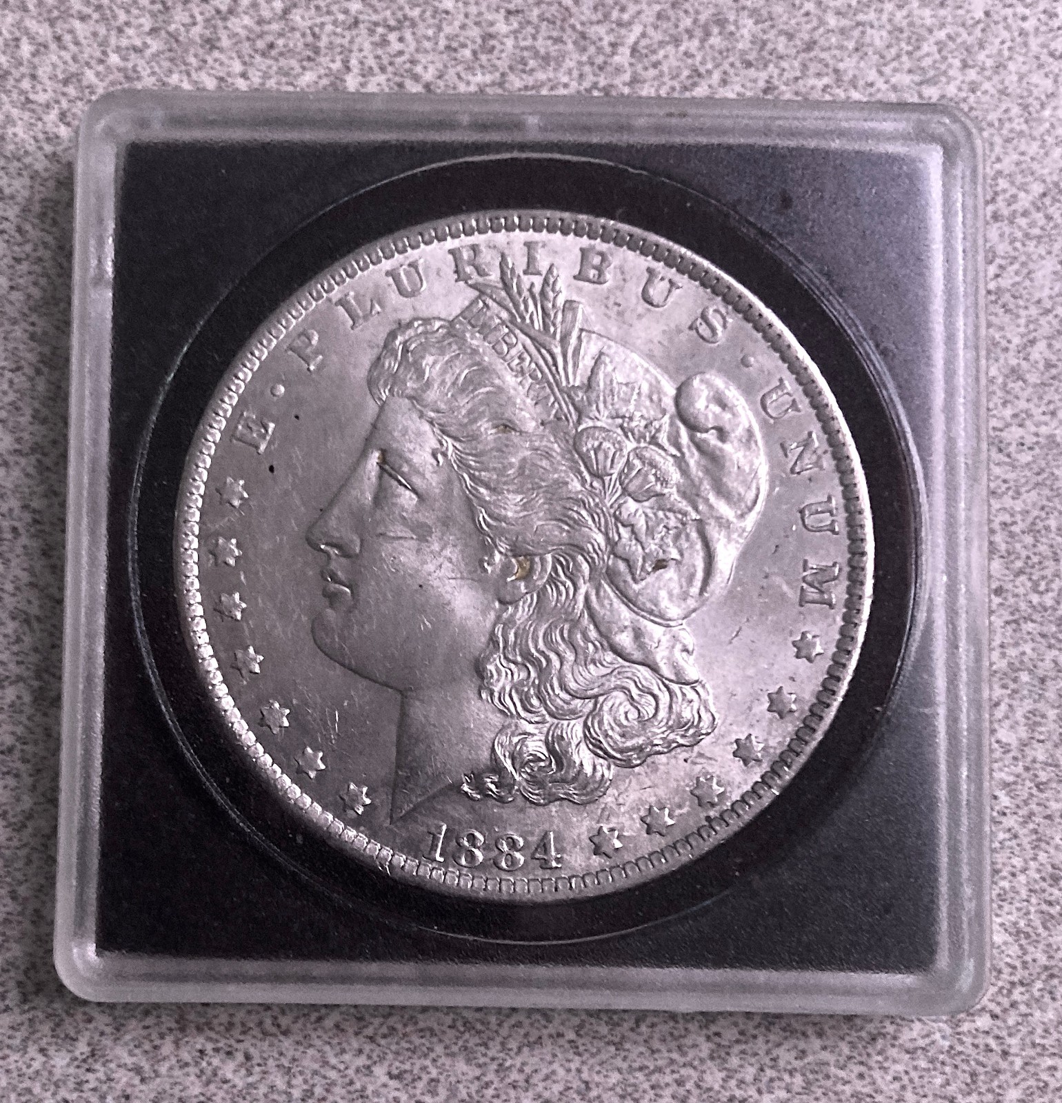 1884-O  MORGAN SILVER DOLLAR (See photos). FREE SHIPPING  B075