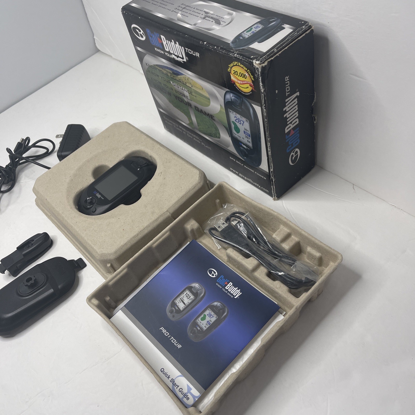 Golf Buddy Tour with Manuals, Belt Clip, Wall Charger, and USB charging cable.