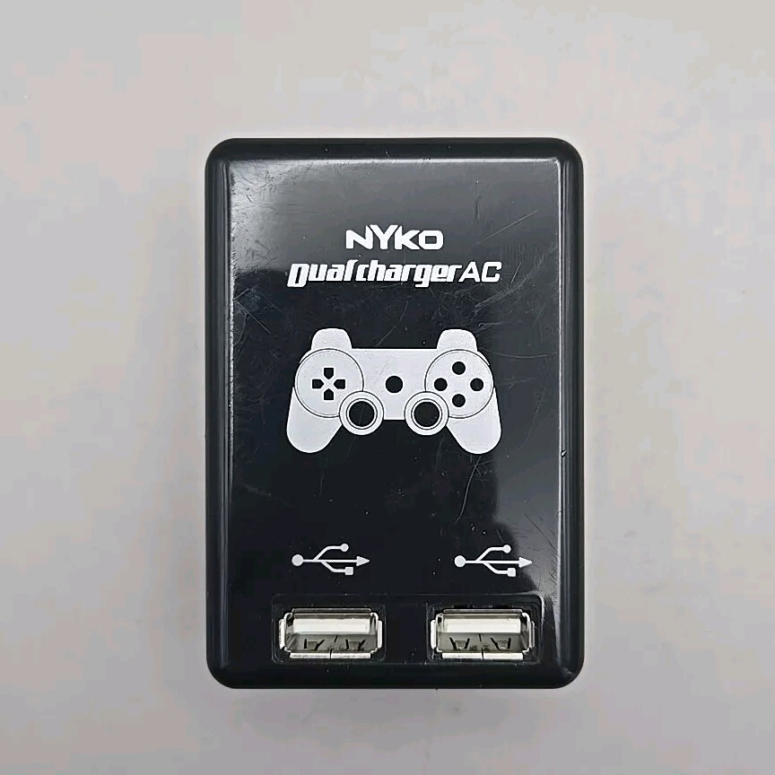 Nyko U.S.A. 2007 Dual Charger AC 83015-H17-0611 Audio/ Video Apparatus