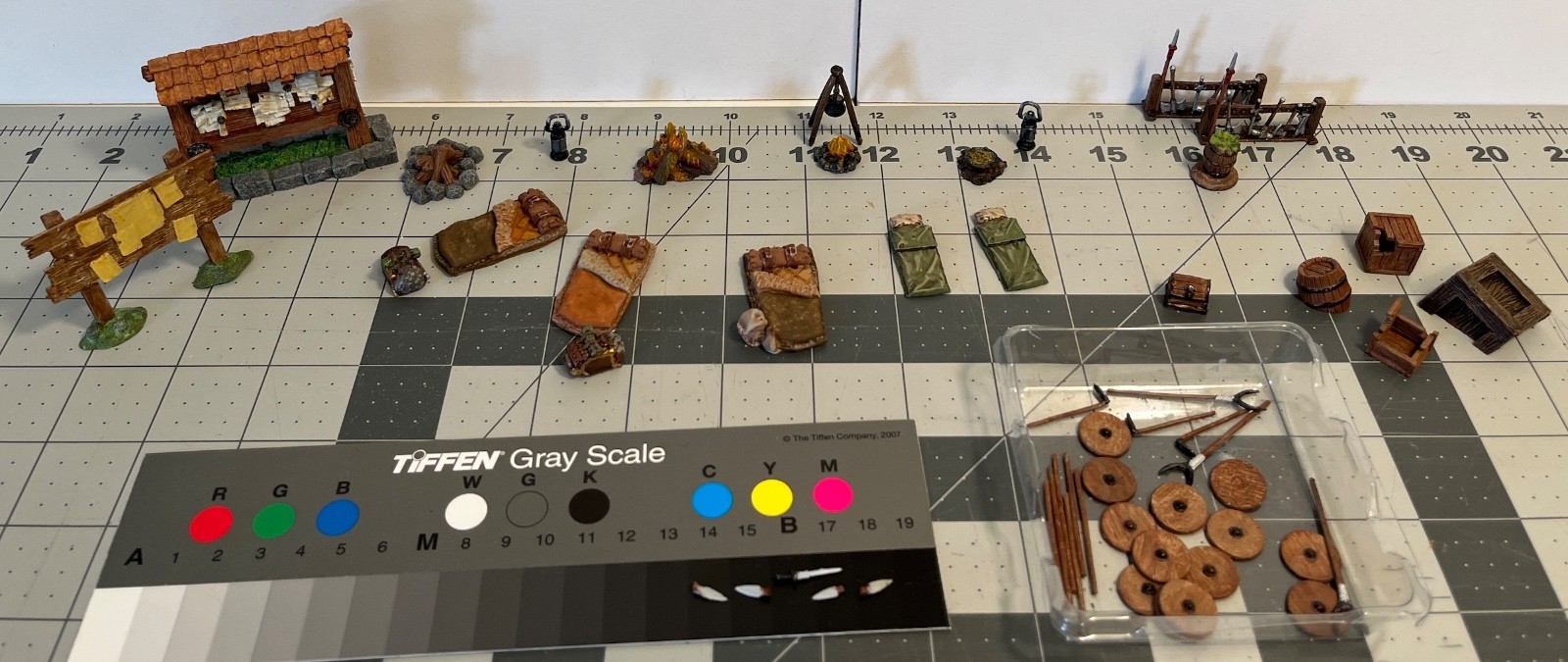 fantasy adventuring assortment bounty boards, camp, weapons, shields, chest, etc