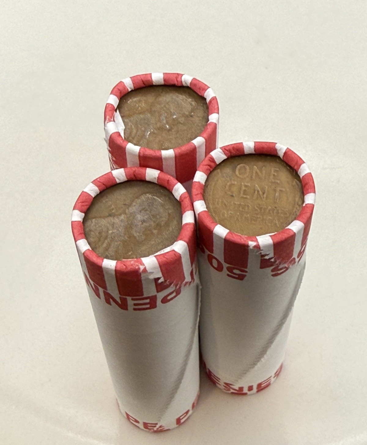 TIGHTLY CRIMPED WHITE BANK WRAPPED ROLLS OF OLD WHEAT PENNIES