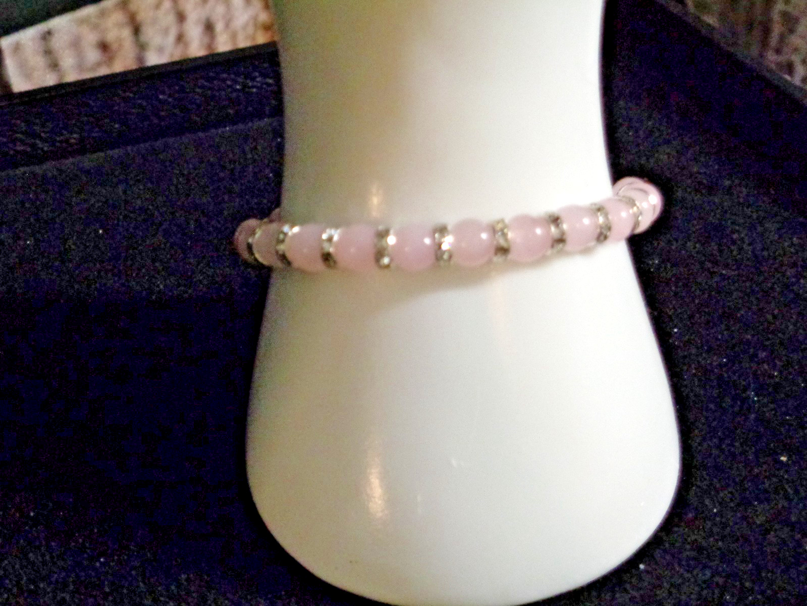 Artisan crafted 7” bracelet of rose quartz, silver plated rhinestone spacers and