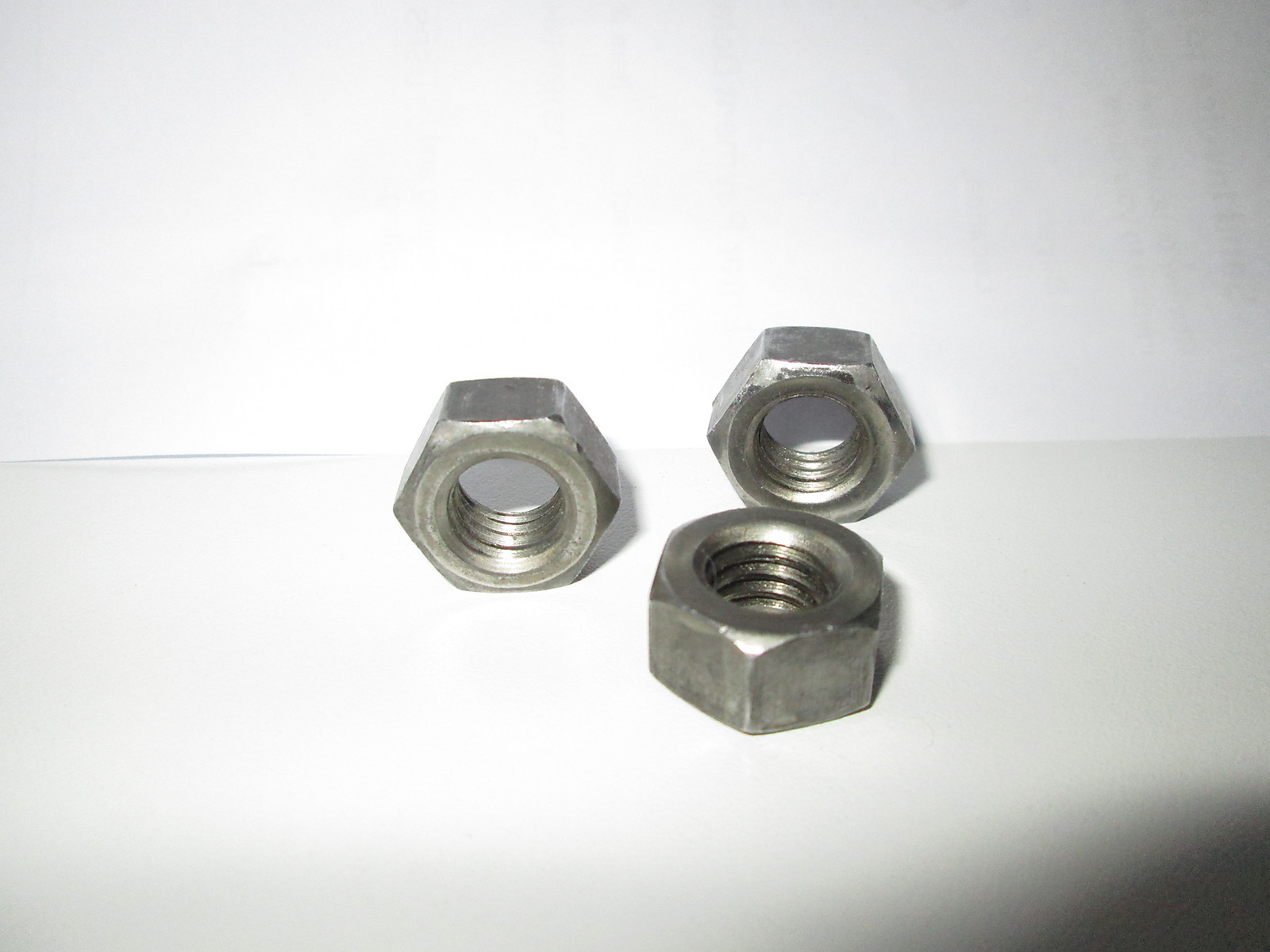 7/16-14 FINISHED HEX NUTS GRADE 2 PLAIN 50 PCS.